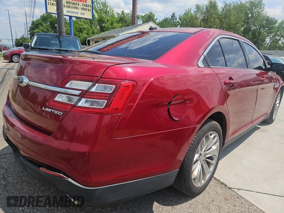 2013 Ford Taurus Limited with VIN 1FAHP2F88DG131171, listed as a Copart auction lot 60704625 with 175,016 mi miles and Clean title. Bid and sale history available at DreamBid. Image 4.