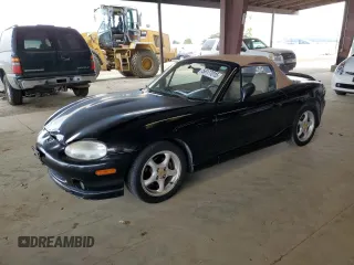 1999 Mazda MX-5 Miata z VIN JM1NB3534X0128918, wystawiony jako Copart lot #56177015 z przebiegiem 86 948 mil mil oraz Szkoda całkowita • Salvage title. Historia ofert i sprzedaży dostępna na DreamBid. Obrazek 1.