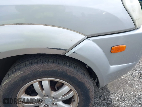 2006 Hyundai Tucson GLS with VIN KM8JN12D26U342722, listed as a IAAI auction lot 41998925 with 105,966 mi miles. Bid and sale history available at carsss.com. Image 13.
