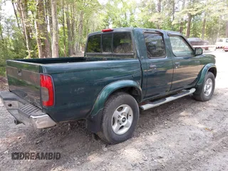 2000 Nissan Frontier XE z VIN 1N6ED27TXYC350670, wystawiony jako IAAI lot #42422277 z przebiegiem 192 897 mil mil oraz . Historia ofert i sprzedaży dostępna na DreamBid. Obrazek 4.
