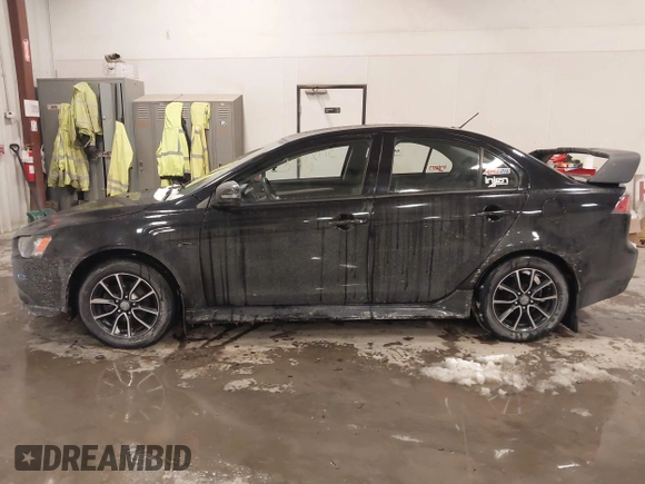 2015 Mitsubishi Lancer SE with VIN JA32V2FW6FU019508, listed as a IAAI auction lot 41633196 with 91,758 mi miles. Bid and sale history available at carsss.com. Image 14.