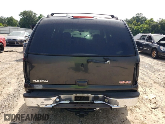 2004 GMC Yukon SLE with VIN 1GKEC13V54R295239, listed as a Copart auction lot 65234124 with 255,760 mi miles and Salvage Title. Bid and sale history available at carsss.com. Image 6.