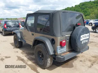 2003 Jeep Wrangler SE with VIN 1J4FA29193P302424, listed as a IAAI auction lot 42179494 with 120,712 mi miles and . Bid and sale history available at DreamBid. Image 3.
