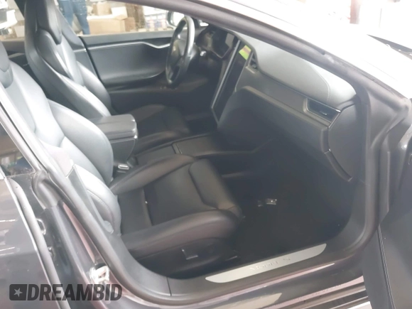 2018 Tesla Model S 75D with VIN 5YJSA1E28JF298208, listed as a IAAI auction lot 42438793 with Not provided miles and . Bid and sale history available at DreamBid. Image 5.