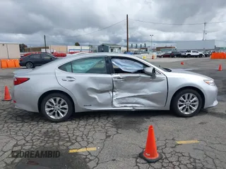 2015 Lexus ES 300h with VIN JTHBW1GG1F2084938, listed as a IAAI auction lot 41761844 with 69,854 mi miles and . Bid and sale history available at DreamBid. Image 13.
