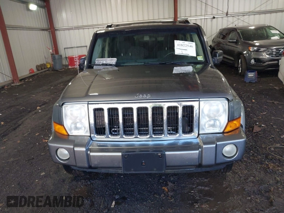 2008 Jeep Commander Sport z VIN 1J8HH48K08C167681, wystawiony jako IAAI lot #41822546 z przebiegiem 155 572 mil mil oraz . Historia ofert i sprzedaży dostępna na DreamBid. Obrazek 12.