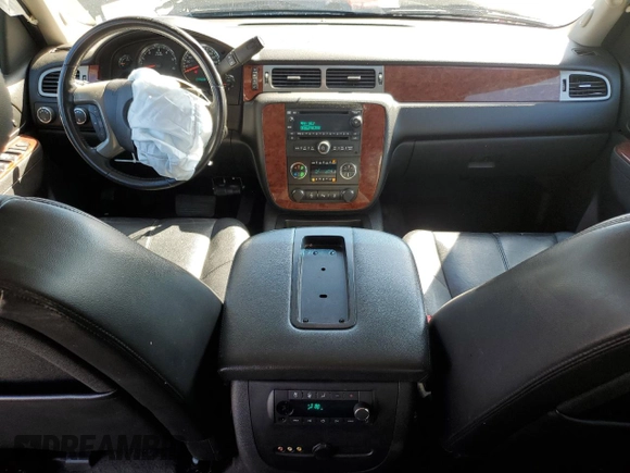 2013 Chevrolet Suburban LT with VIN 1GNSKJE70DR138631, listed as a Copart auction lot 57778185 with 176,934 mi miles and Salvage title. Bid and sale history available at DreamBid. Image 8.