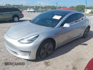2018 Tesla Model 3 Long Range Battery with VIN 5YJ3E1EB7JF104356, listed as a IAAI auction lot 41936961 with 90,932 mi miles and . Bid and sale history available at DreamBid. Image 2.