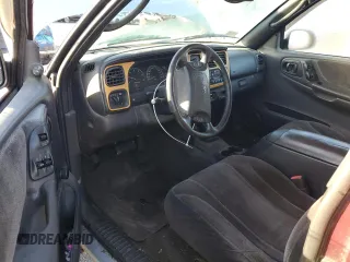 2000 Dodge Dakota SLT with VIN 1B7GG22X7YS639007, listed as a Copart auction lot 84829204 with 148,408 mi miles and Salvage Title. Bid and sale history available at DreamBid. Image 8.