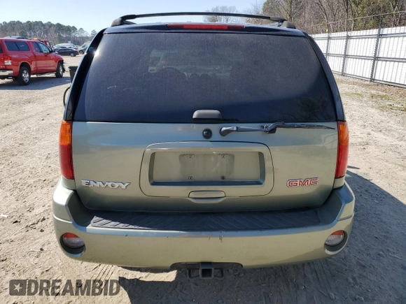 2004 GMC Envoy SLE with VIN 1GKDS13S542324252, listed as a Copart auction lot 48667895 with 206,206 mi miles and Salvage Title. Bid and sale history available at carsss.com. Image 6.