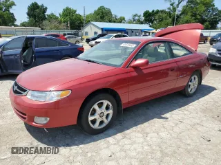 2000 Toyota Solara SE with VIN 2T1CF28P5YC274613, listed as a Copart auction lot 60915435 with 242,359 mi miles and Salvage title. Bid and sale history available at DreamBid. Image 1.