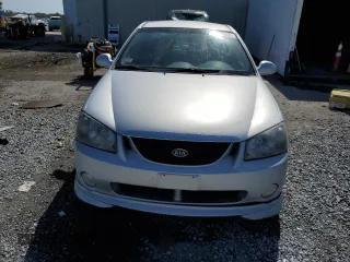2005 Kia Spectra with VIN KNAFE162155081155, listed as a Copart auction lot 53893255 with 127,937 mi miles and Salvage Title. Bid and sale history available at carsss.com. Image 5.