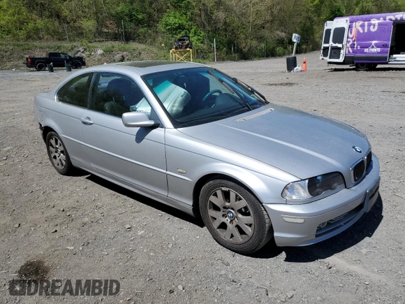 2000 BMW 3 Series 323Ci with VIN WBABM3345YJN83679, listed as a Copart auction lot 54029145 with 165,327 mi miles and Salvage Title. Bid and sale history available at DreamBid. Image 4.