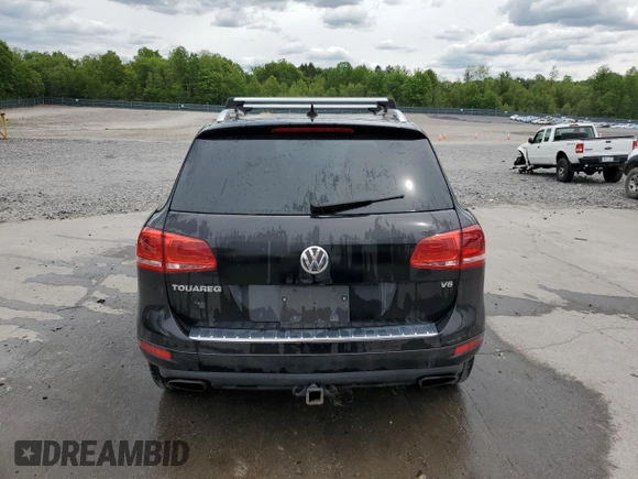 2012 Volkswagen Touareg Sport z VIN WVGEF9BP7CD009824, wystawiony jako Copart lot #58311915 z przebiegiem 154 397 mil mil oraz Szkoda całkowita • Salvage title. Historia ofert i sprzedaży dostępna na DreamBid. Obrazek 6.