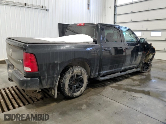 2016 Ram 1500 Tradesman z VIN 1C6RR7KM7GS285498, wystawiony jako Copart lot #81280764 z przebiegiem 188 289 mil mil oraz Szkoda całkowita • Salvage title. Historia ofert i sprzedaży dostępna na DreamBid. Obrazek 3.