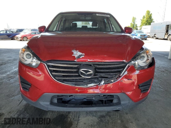 2016 Mazda CX-5 Sport with VIN JM3KE2BY8G0837203, listed as a Copart auction lot 54960845 with 116,656 mi miles and Salvage title. Bid and sale history available at DreamBid. Image 5.