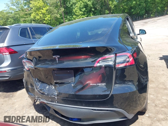 2022 Tesla Model Y Long Range z VIN 7SAYGDEE4NA006645, wystawiony jako IAAI lot #42192495 z przebiegiem 28 784 mil mil oraz . Historia ofert i sprzedaży dostępna na DreamBid. Obrazek 16.