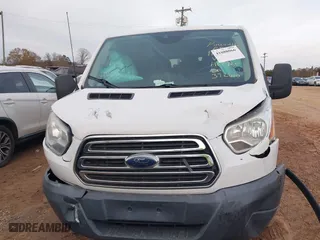 2016 Ford Transit Wagon XL with VIN 1FBZX2ZM7GKA63765, listed as a IAAI auction lot 41088066 with 103,803 mi miles. Bid and sale history available at carsss.com. Image 12.