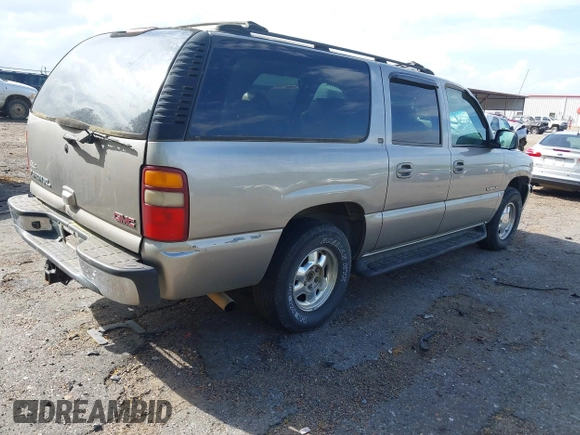 2002 GMC Yukon XL SLT z VIN 3GKFK16Z42G208742, wystawiony jako IAAI lot #41956838 z przebiegiem 261 835 mil mil oraz . Historia ofert i sprzedaży dostępna na DreamBid. Obrazek 4.