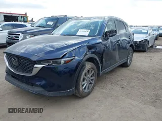 2023 Mazda CX-5 S Carbon Edition z VIN JM3KFBCM4P0288155, wystawiony jako IAAI lot #41501030 z przebiegiem 26 516 mil mil oraz . Historia ofert i sprzedaży dostępna na DreamBid. Obrazek 17.