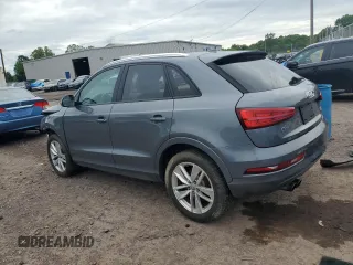 2017 Audi Q3 Premium z VIN WA1ECCFS5HR001606, wystawiony jako Copart lot #58276485 z przebiegiem 93 037 mil mil oraz Tytuł czysty. Historia ofert i sprzedaży dostępna na DreamBid. Obrazek 2.