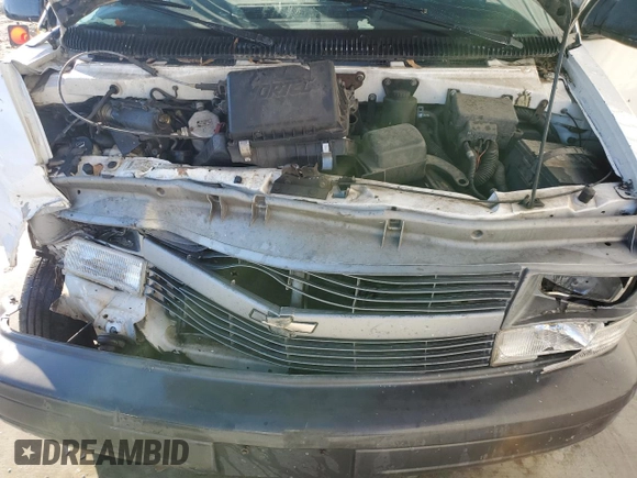 2004 Chevrolet Astro Cargo z VIN 1GCDM19X74B117502, wystawiony jako Copart lot #87210454 z przebiegiem Nie podano mil oraz Szkoda całkowita • Salvage title. Historia ofert i sprzedaży dostępna na DreamBid. Obrazek 12.