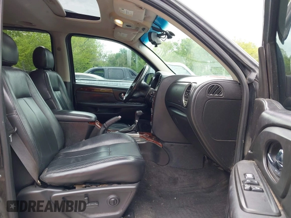 2005 GMC Envoy XL SLE with VIN 1GKET16S156114805, listed as a IAAI auction lot 42163519 with 168,584 mi miles. Bid and sale history available at carsss.com. Image 5.