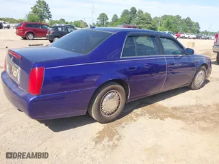 2005 Cadillac DeVille with VIN 1G6KD54Y95U214904, listed as a IAAI auction lot 42014527 with 144,207 mi miles. Bid and sale history available at carsss.com. Image 4.