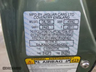1999 Jaguar XJ with VIN SAJKX6049XC854232, listed as a Copart auction lot 76191414 with 0 mi miles and Salvage Title. Bid and sale history available at carsss.com. Image 13.