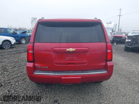 2015 Chevrolet Tahoe LTZ z VIN 1GNSKCKC6FR276531, wystawiony jako IAAI lot #41692617 z przebiegiem 124 010 mil mil oraz . Historia ofert i sprzedaży dostępna na DreamBid. Obrazek 16.
