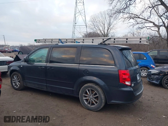 2014 Dodge Grand Caravan SXT with VIN 2C4RDGCG8ER257837, listed as a IAAI auction lot 41211629 with 139,231 mi miles and . Bid and sale history available at DreamBid. Image 15.