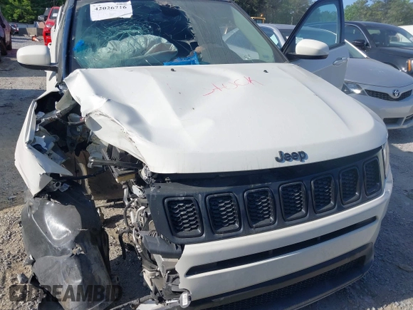 2021 Jeep Compass Altitude with VIN 3C4NJDBB2MT596181, listed as a IAAI auction lot 42026716 with 69,526 mi miles and . Bid and sale history available at DreamBid. Image 10.