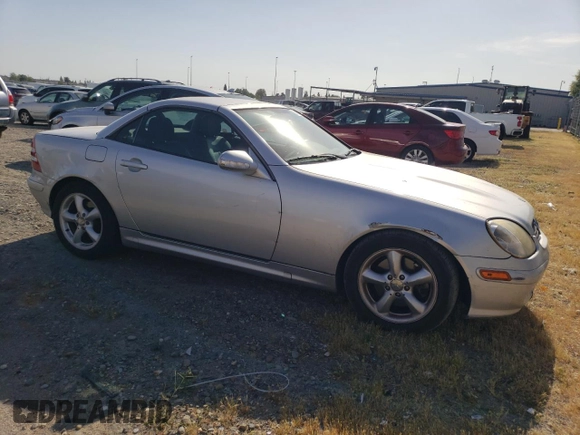 2001 Mercedes-Benz SLK-Class with VIN WDBKK65F11F178256, listed as a Copart auction lot 54979975 with 95,439 mi miles and Salvage Title. Bid and sale history available at carsss.com. Image 4.
