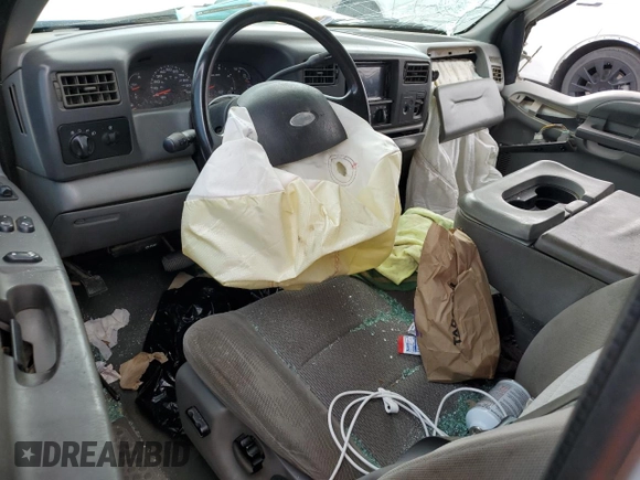 2004 Ford F-250 XL with VIN 1FTNX20PX4EA22882, listed as a Copart auction lot 79014334 with 262,447 mi miles and Salvage title. Bid and sale history available at DreamBid. Image 8.