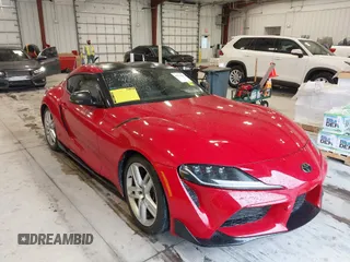 2023 Toyota Supra 3.0 with VIN WZ1DB0G00PW056708, listed as a IAAI auction lot 41379821 with 34,610 mi miles and . Bid and sale history available at DreamBid. Image 1.