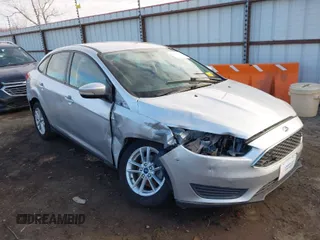 2016 Ford Focus SE z VIN 1FADP3F25GL367580, wystawiony jako IAAI lot #41313374 z przebiegiem 147 603 mil mil oraz . Historia ofert i sprzedaży dostępna na DreamBid. Obrazek 1.