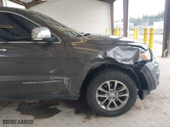 2015 Jeep Grand Cherokee Limited with VIN 1C4RJFBG4FC852117, listed as a IAAI auction lot 41905996 with 137,337 mi miles. Bid and sale history available at carsss.com. Image 6.