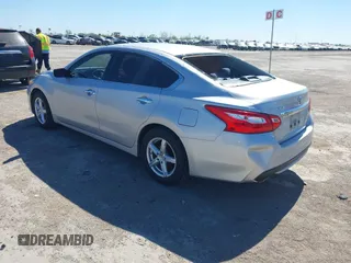 2016 Nissan Altima SR with VIN 1N4AL3AP3GC214309, listed as a IAAI auction lot 41863450 with 114,302 mi miles and . Bid and sale history available at carsss.com. Image 3.