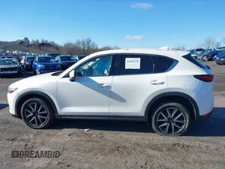 2017 Mazda CX-5 Grand Touring with VIN JM3KFBDL6H0188517, listed as a IAAI auction lot 41093178 with 98,831 mi miles. Bid and sale history available at carsss.com. Image 14.