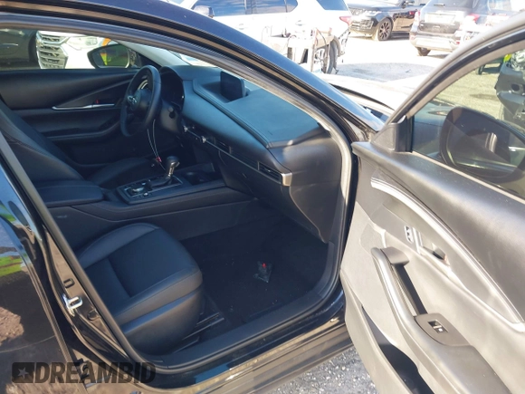 2023 Mazda CX-30 S Select with VIN 3MVDMBBM9PM508958, listed as a IAAI auction lot 42009029 with 21,219 mi miles and . Bid and sale history available at DreamBid. Image 5.