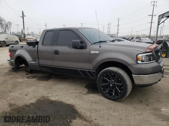 2004 Ford F-150 STX with VIN 1FTRX02W74KC08388, listed as a Copart auction lot 87290524 with 189,003 mi miles and Salvage title. Bid and sale history available at DreamBid. Image 4.