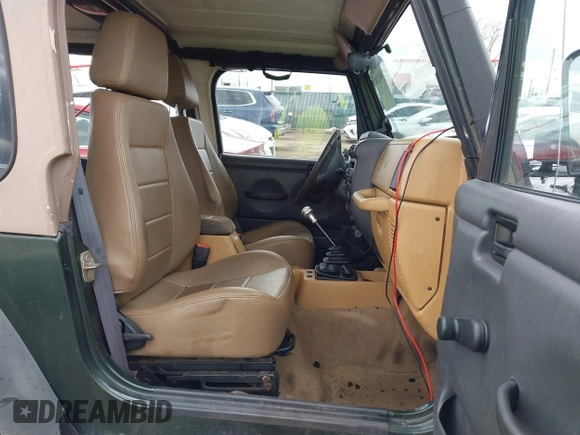 1997 Jeep Wrangler SE with VIN 1J4FY29PXVP406939, listed as a IAAI auction lot 41612380 with 248,314 mi miles. Bid and sale history available at carsss.com. Image 5.