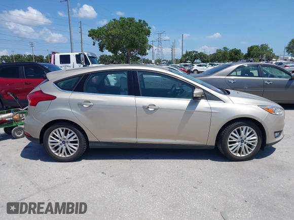 2017 Ford Focus Titanium с VIN 1FADP3N21HL327581, выставлен на аукционе IAAI как лот 42342179 с пробегом 61 489 миль миль и . История ставок и продаж доступна на DreamBid. Изображение 13.