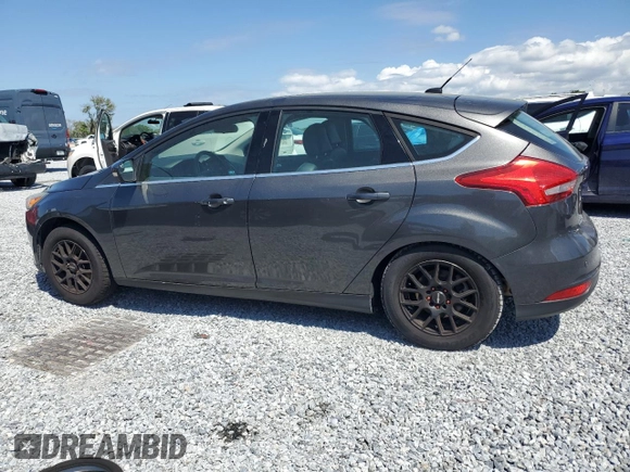2015 Ford Focus Titanium with VIN 1FADP3N24FL260486, listed as a Copart auction lot 49856865 with Not provided miles and Clean title. Bid and sale history available at DreamBid. Image 2.