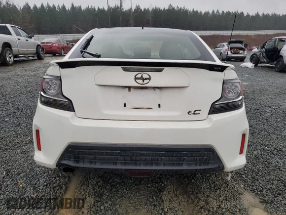 2014 Scion tC z VIN JTKJF5C78E3086696, wystawiony jako Copart lot #84040544 z przebiegiem 83 973 mil mil oraz Szkoda całkowita • Salvage title. Historia ofert i sprzedaży dostępna na DreamBid. Obrazek 6.