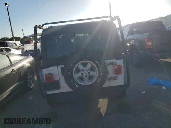 2006 Jeep Wrangler Sport Right Hand Drive with VIN 1J4F449SX6P733578, listed as a Copart auction lot 75113494 with 0 mi miles and Salvage Title. Bid and sale history available at carsss.com. Image 6.