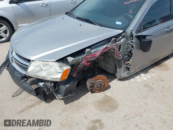 2014 Dodge Avenger SE with VIN 1C3CDZAB9EN143677, listed as a IAAI auction lot 42068802 with 142,134 mi miles and . Bid and sale history available at DreamBid. Image 6.