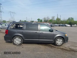 2017 Dodge Grand Caravan SE Plus z VIN 2C4RDGBGXHR549334, wystawiony jako IAAI lot #42097288 z przebiegiem 60 896 mil mil oraz . Historia ofert i sprzedaży dostępna na DreamBid. Obrazek 13.