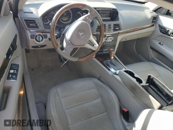 2012 Mercedes-Benz E 550 with VIN WDDKJ7DB2CF151973, listed as a Copart auction lot 82667474 with 130,590 mi miles and Salvage Title. Bid and sale history available at DreamBid. Image 8.