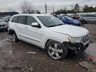 2013 Jeep Grand Cherokee Limited with VIN 1C4RJFBT4DC596751, listed as a Copart auction lot 85324604 with 141,967 mi miles and Salvage Title. Bid and sale history available at carsss.com. Image 4.